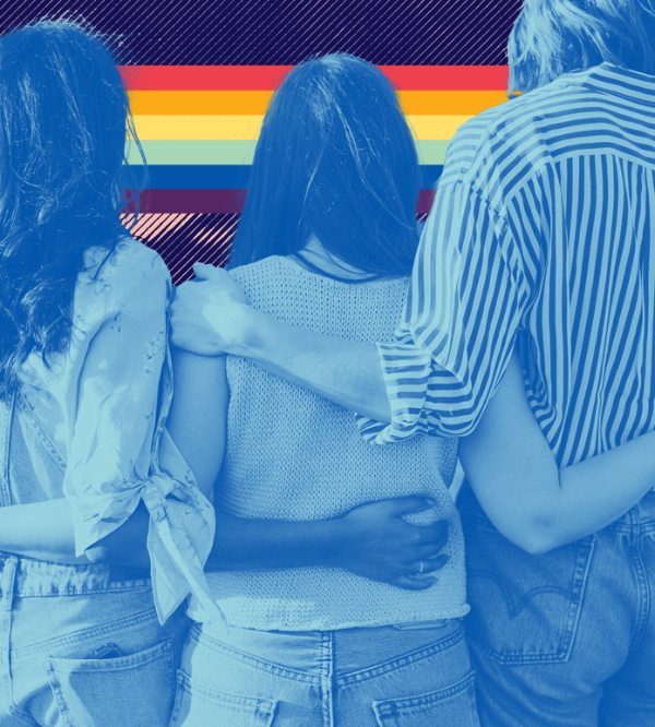 people with their arms around one another and a progress flag in the background