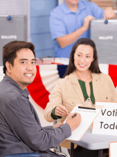 Individual using a wheelchair at a polling location