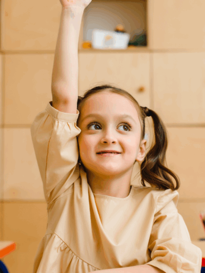 Girl raising hand