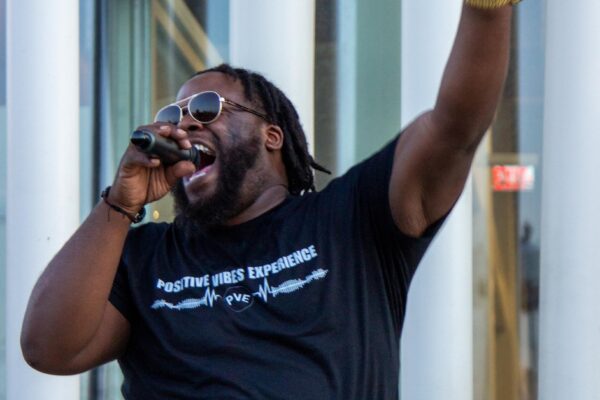 Haneef Salaam performing with a microphone