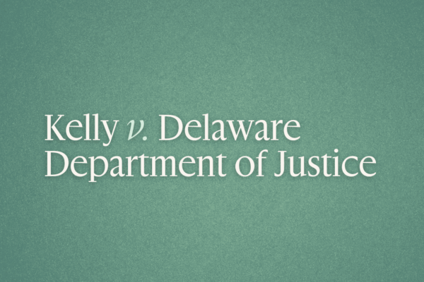 White text on green background that reads "Kelly v. Delaware Department of Justice"