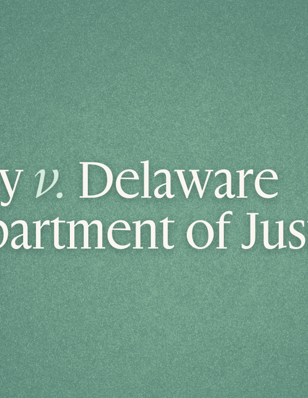 White text on green background that reads "Kelly v. Delaware Department of Justice"