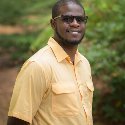 Tobi in a yellow button-up shirt