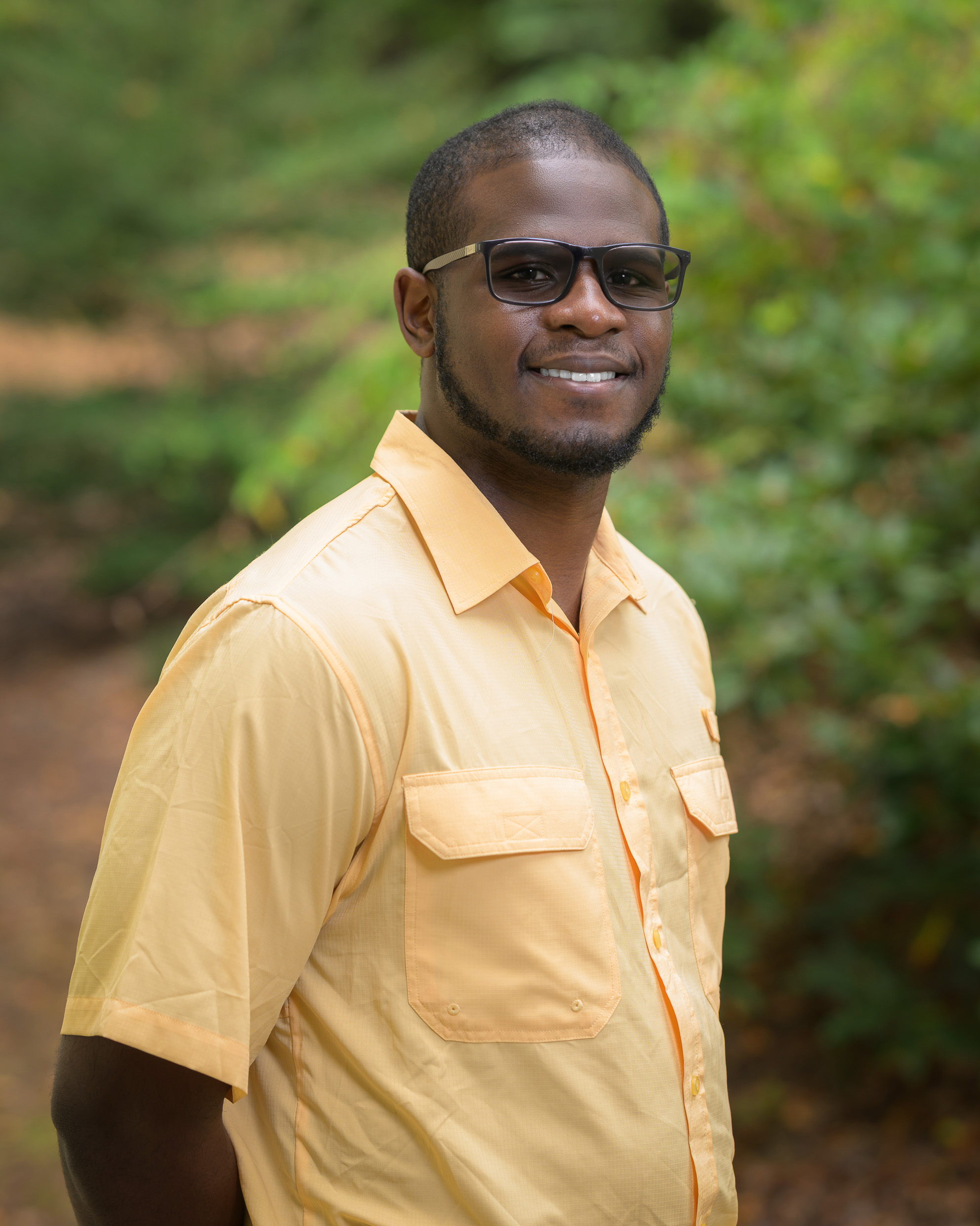 Tobi in a yellow button-up shirt