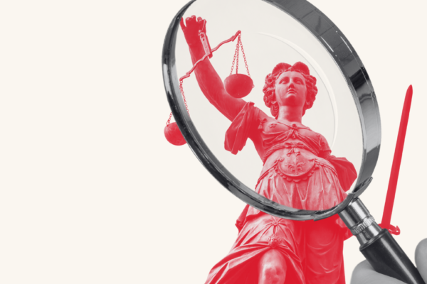 Lady justice under a magnifying gladd