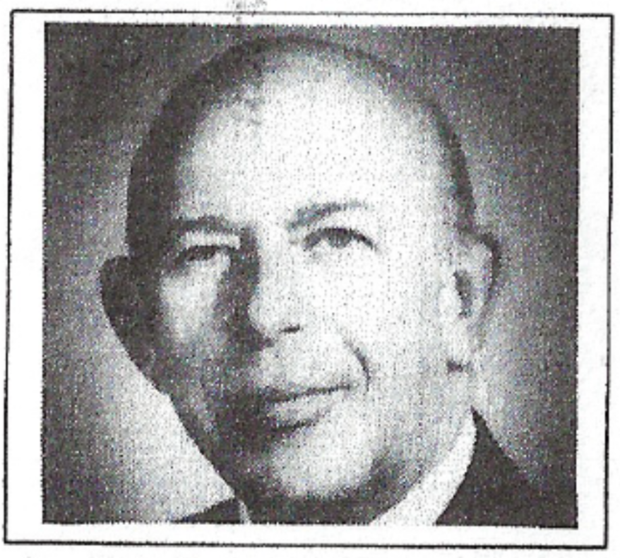 A portrait headshot of Irving Morris.
