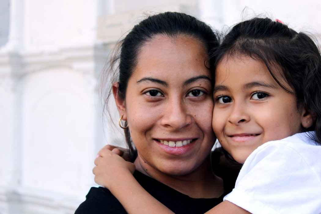 Woman holding daughter