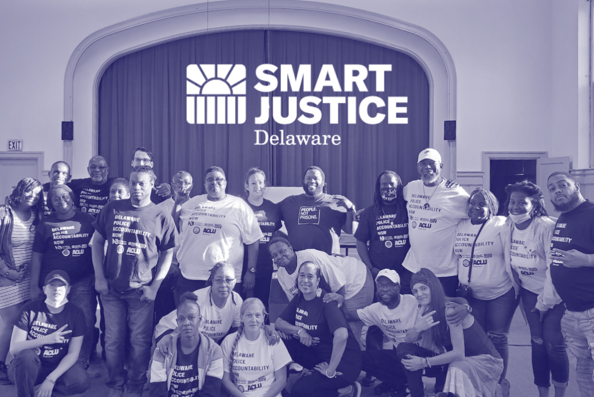 A group photo, tinted dark blue, of the 2021 Smart Justice Ambassador cohort. Above the participants is the Smart Justice Delaware logo.