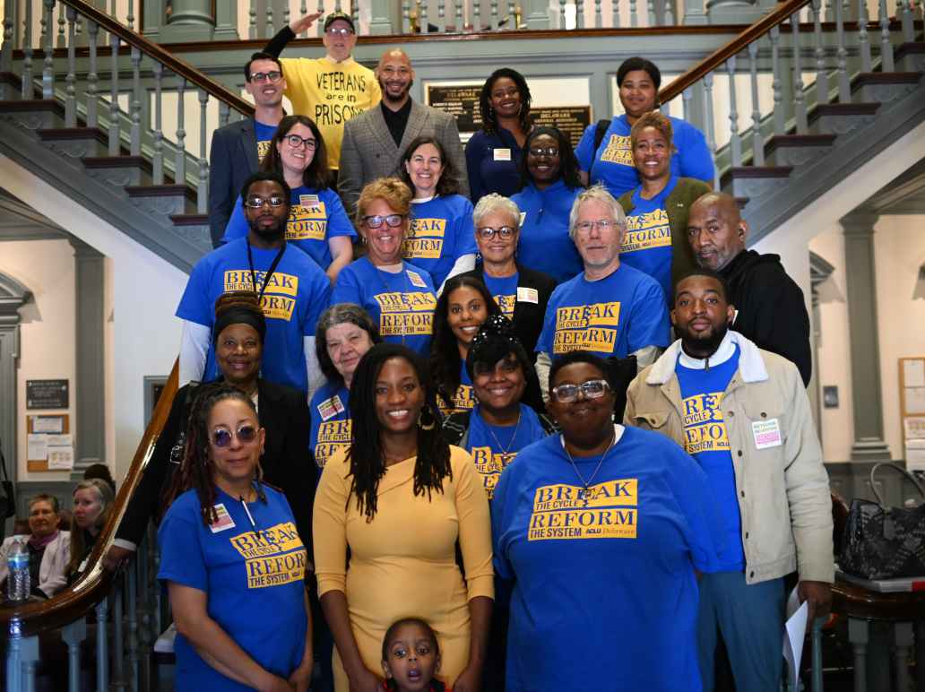 ACLU-DE staff and advocates pose on the stairs of Legislative Hall with Sen. Marie Pinkney