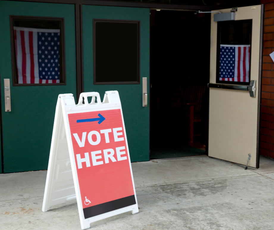 Vote here sign