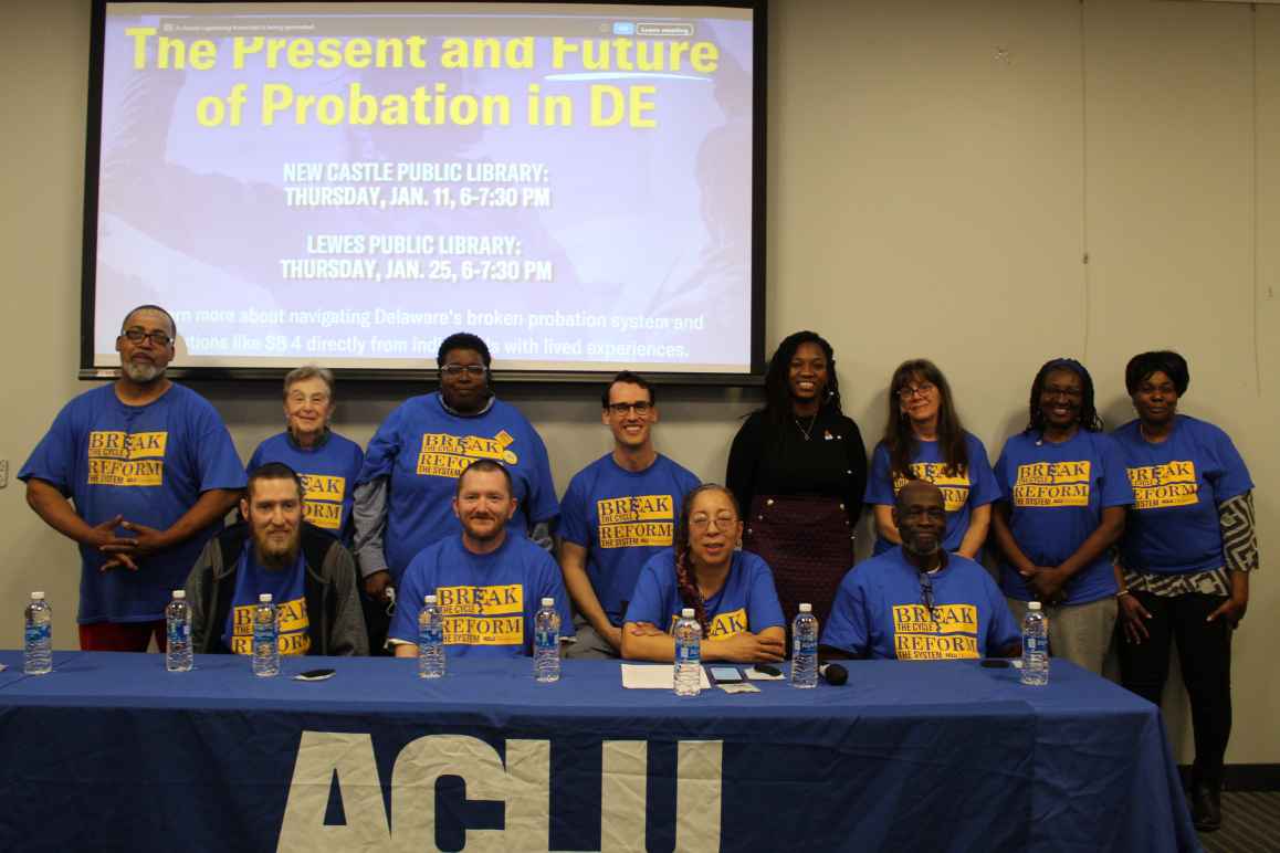 Posed group photo of ACLU-DE staff, Senator Marie Pinkney, and Smart Justice Ambassadors