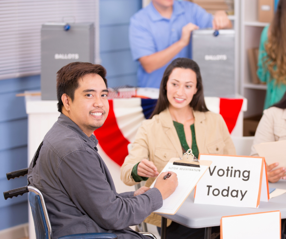 Individual using a wheelchair at a polling location 