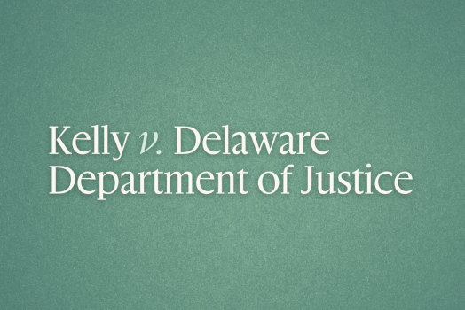 White text on green background that reads "Kelly v. Delaware Department of Justice"