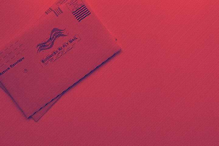 Vote by mail ballot on red and blue background