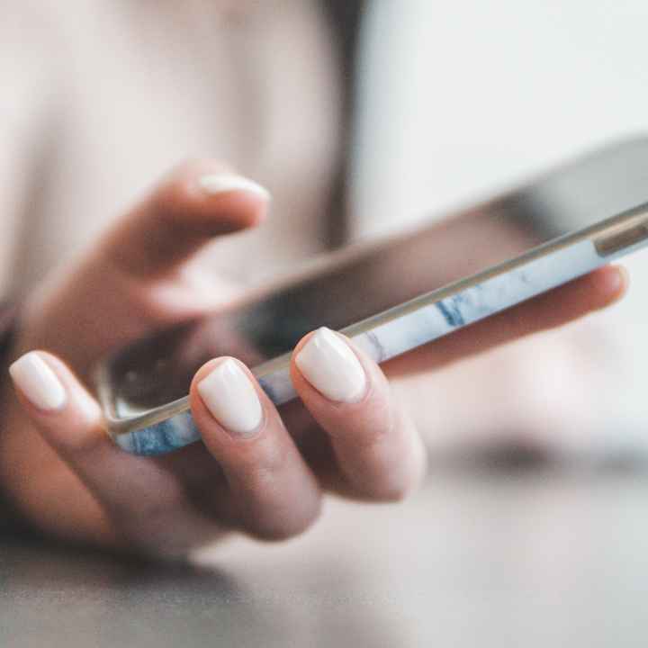Hand holding phone