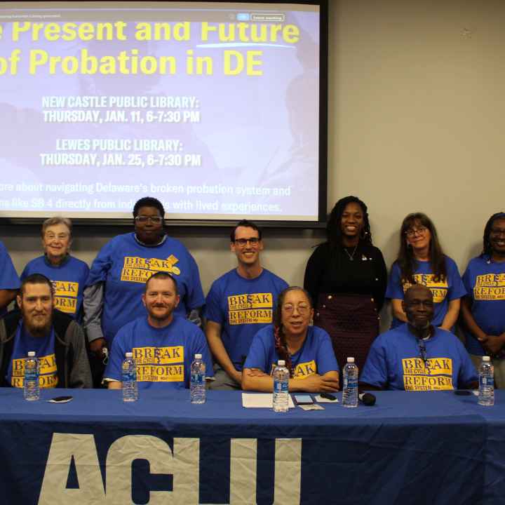 Posed group photo of ACLU-DE staff, Senator Marie Pinkney, and Smart Justice Ambassadors