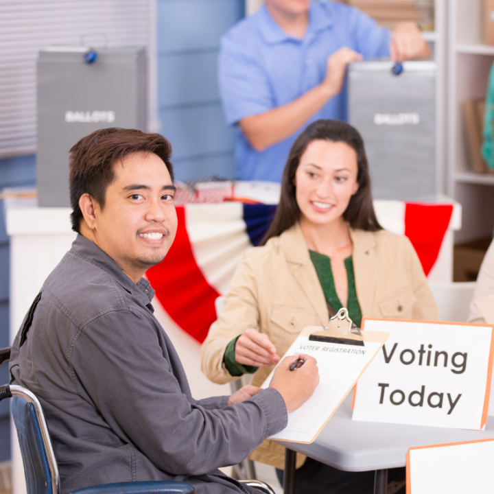 Individual using a wheelchair at a polling location 